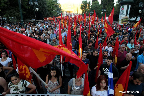 Members of Greek Communist Party take part in an anti-EU rally in front of Parliament, Athens, Greece, on July 2, 2015. A referendum on bailout proposals will be held on July 5. [Photo/Xinhua]