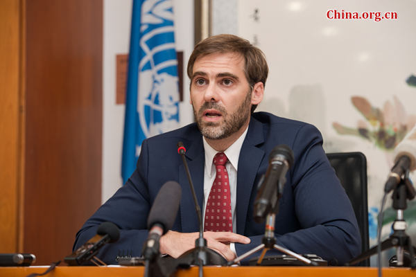 Juan Pablo Bohoslavsky, the United Nations Independent Expert on foreign debt, holds a press conference on Monday, July 6, 2015, at the U.N. China headquarters in Beijing, to brief on the achievement of his latest China visit. [Photo by Chen Boyuan / China.org.cn]