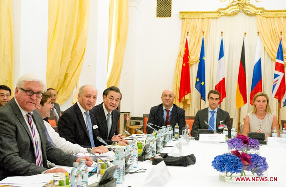 Delegates from the EU and P5+1, the five UN Security Council permanent members plus Germany, attend a meeting on the sidelines of the nuclear talks between Iran and world powers in Vienna, capital of Austria, on July 7, 2015. July 7 is the deal deadline of Iranian nuclear negotiations. [Photo/Xinhua]