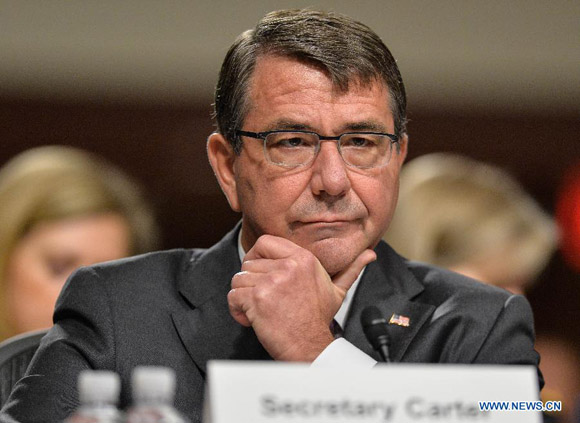 U.S. Defense Secretary Ash Carter prepares to testify before a Senate Armed Services Committee hearing on anti-IS strategy on Capitol Hill in Washington D.C., capital of the United States, July 7, 2015. U.S. defense chief said Tuesday that execution of the U.S. strategy against the extremist group, the Islamic State, fell short of expectation. [Photo/Xinhua]