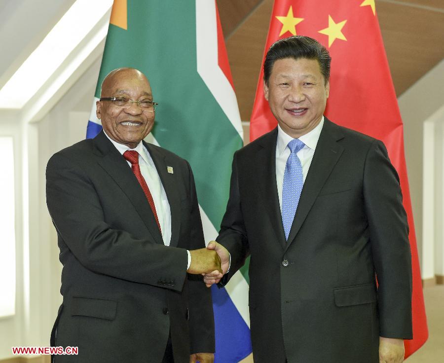 Chinese President Xi Jinping (R) meets with South African President Jacob Zuma in Ufa, Russia, July 9, 2015. [Photo: Xinhua] 