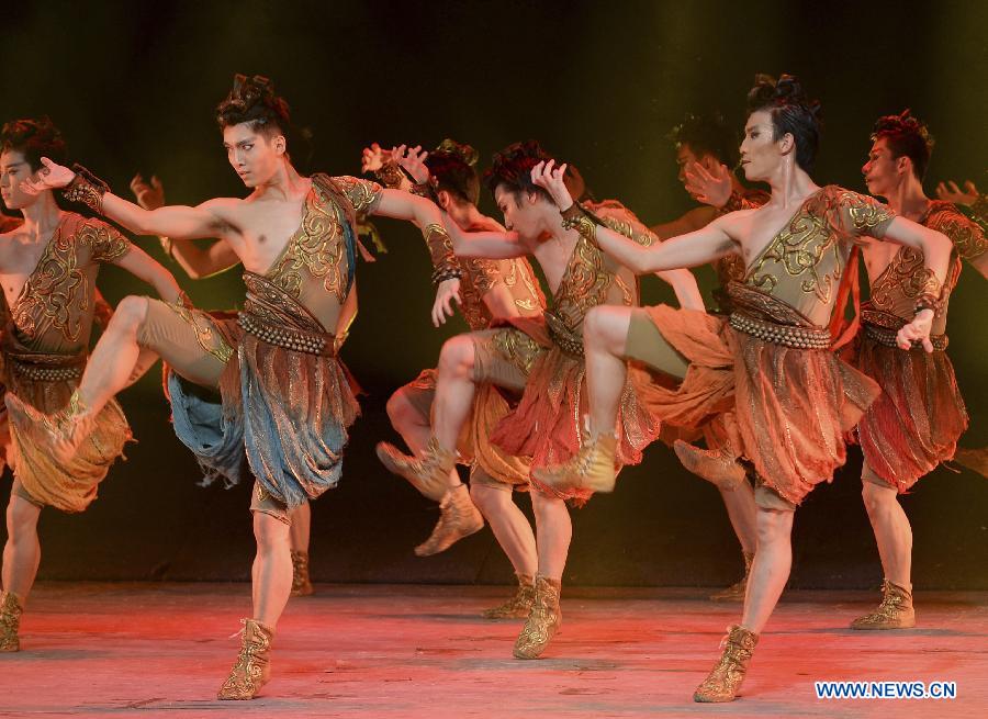 Dancers from Beijing Dance Academy perform during the 4th China Xinjiang International Folk Dancing Festival in Urumqi, northwest China's Xinjiang Uygur Autonomous Region, July 28, 2015. [Xinhua]