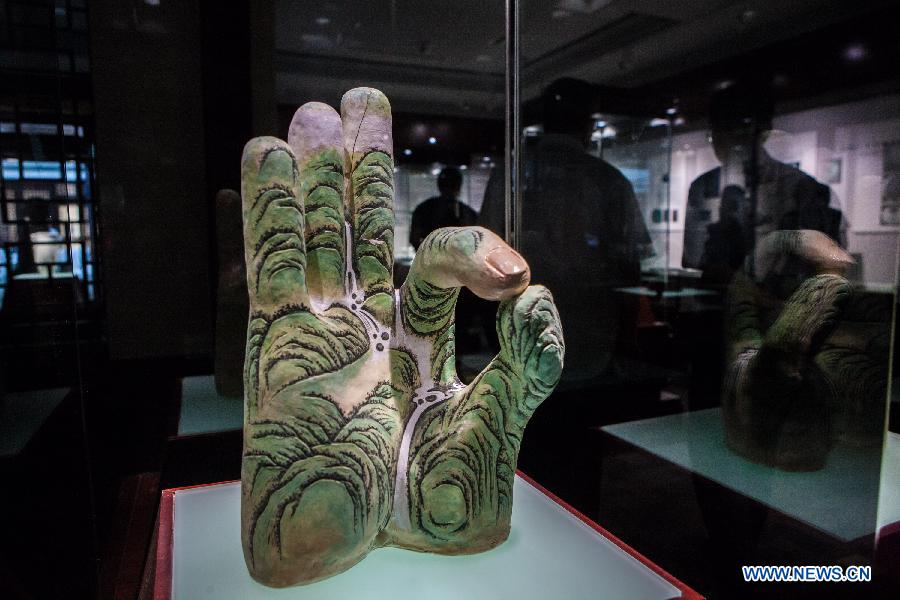 Photo taken on July 29, 2015 shows a ceramic art work, Mountain Finger by Zhou Guangzhen, at Beijing Guozhong Ceramic Art Center in Beijing, capital of China.