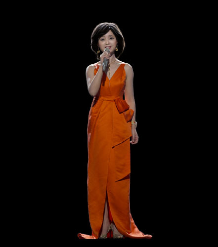  A virtual version of the Chinese pop icon Teresa Teng sings on stage in Taipei in May, 2015. A virtual concert featuring Teng will be held in Shanghai in August. [China.org.cn] 