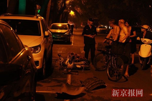 The picture shows the scene of the accident, where an Audi car hit several people in Beijing on July 29, 2015. [Photo: The Beijing News/Luqianguo] 