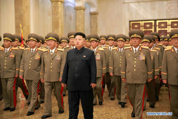 The top leader of the Democratic People's Republic of Korea (DPRK) Kim Jong Un (C) [Photo/Xinhua]