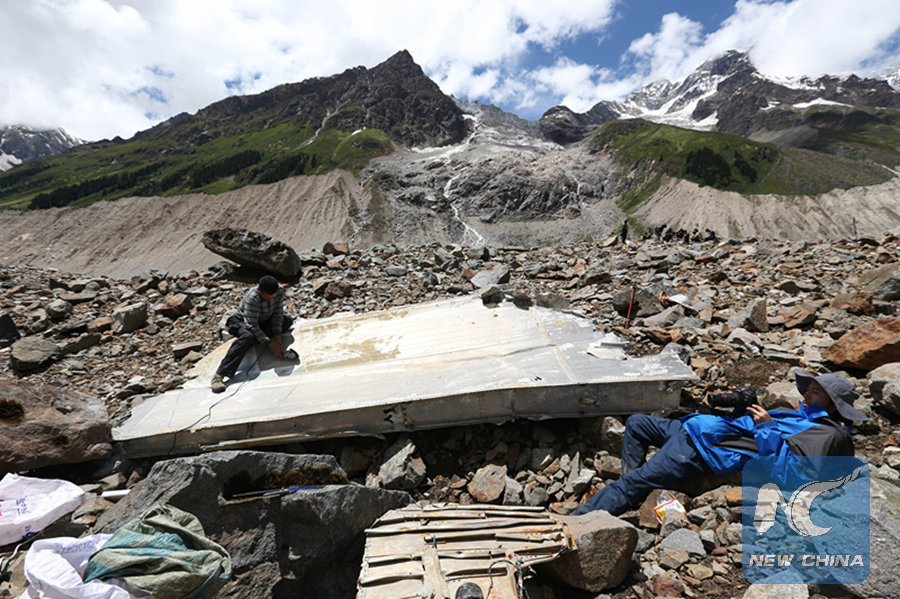 Volunteers are collecting the remains of a United States army C-87 transport airplane in Nyingchi, Tibet on August 8, 2015.