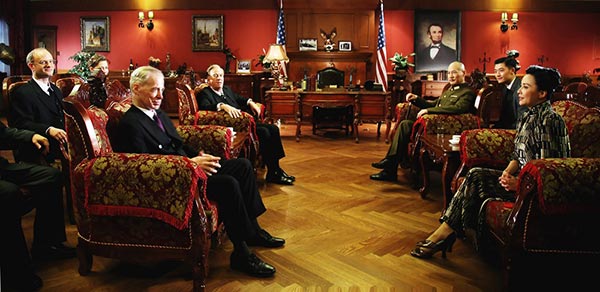 A scene shows then-US president Franklin Roosevelt (fourth from left) meeting Kuomintang leader Chiang Kai-shek (third from right) during the Cairo Conference. [Photo provided to China Daily]