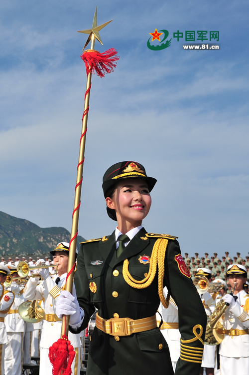 A nearly 1,300-member PLA military band, which is composed of selected performers from the three armed forces -- army, navy and air force, is scheduled to present a non-stop two-hour show for the Sept 3 military parade marking the 70th anniversary of the end of World War II. The Military Band of the Chinese People's Liberation Army (PLA), which was founded in July 1952, is the only one large wind band in China. It is directly under the General Political Department of the PLA. [www.81.cn]