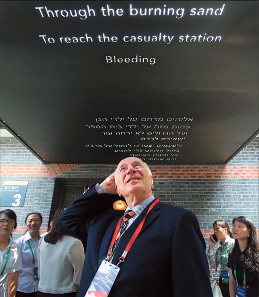 Ron Klinger, grandson of the founder of the White Horse Cafe in Hongkou District, where Jews used to meet, attends its reopening yesterday. — Wang Rongjiang 