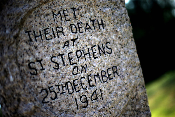 A headstone dedicated to the doctors and nurses at St Stephen's College Hospital, who were murdered by Japanese soldiers in December 1941. Edmond Tang / China Daily