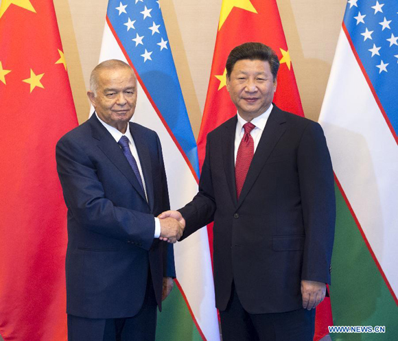 Chinese President Xi Jinping (R) meets with President of Uzbekistan Islam Karimov in Beijing, capital of China, Sept. 2, 2015. [Photo/Xinhua]