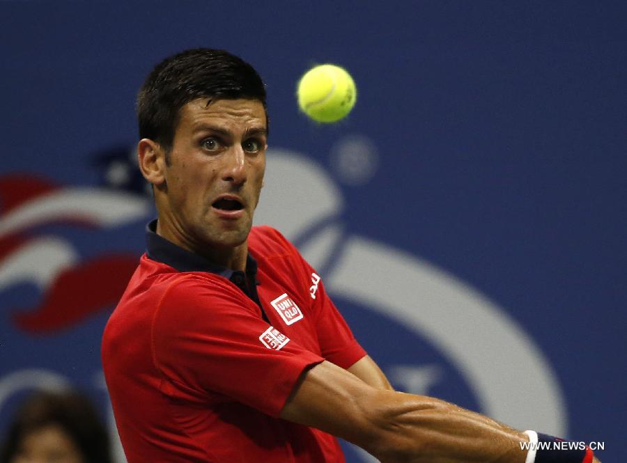 Novak Djokovic of Serbia returns a ball to Andreas Haider-Maurer of Austria during the men's singles second round match at the 2015 U.S. Open in New York, the United States, Sept. 2, 2015. Novak Djokovic won 3-0 to enter the next round. [Photo/Xinhua] 