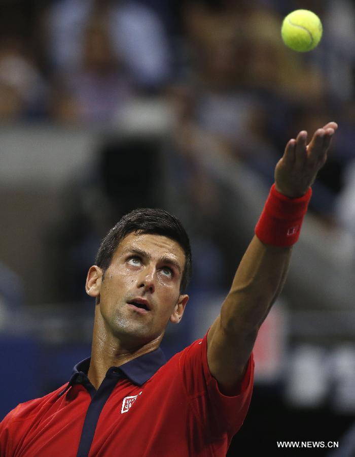 Novak Djokovic of Serbia serves to Andreas Haider-Maurer of Austria during the men's singles second round match at the 2015 U.S. Open in New York, the United States, Sept. 2, 2015. Novak Djokovic won 3-0 to enter the next round. [Photo/Xinhua]