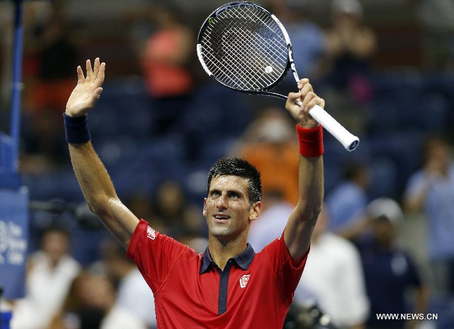 Novak Djokovic of Serbia greets audience after the men's singles second round match against to Andreas Haider-Maurer of Austria at the 2015 U.S. Open in New York, the United States, Sept. 2, 2015. Novak Djokovic won 3-0 to enter the next round. [Photo/Xinhua] 