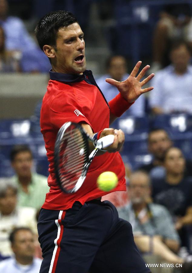 Novak Djokovic of Serbia returns a ball to Andreas Haider-Maurer of Austria during the men's singles second round match at the 2015 U.S. Open in New York, the United States, Sept. 2, 2015. Novak Djokovic won 3-0 to enter the next round. [Photo/Xinhua]