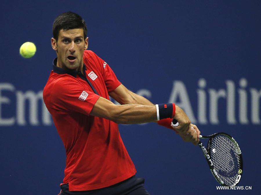 Novak Djokovic of Serbia returns a ball to Andreas Haider-Maurer of Austria during the men's singles second round match at the 2015 U.S. Open in New York, the United States, Sept. 2, 2015. Novak Djokovic won 3-0 to enter the next round. [Photo/Xinhua]