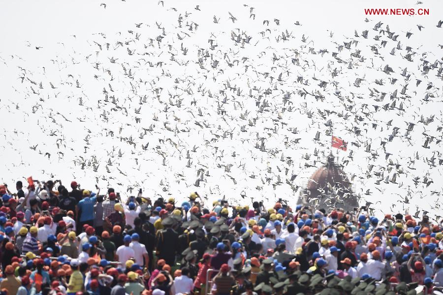 Pigeons are released at the end of the commemoration activities marking the 70th anniversary of the victory of the Chinese People&apos;s War of Resistance Against Japanese Aggression and the World Anti-Fascist War, in Beijing, capital of China, Sept. 3, 2015. [Photo/Xinhu]