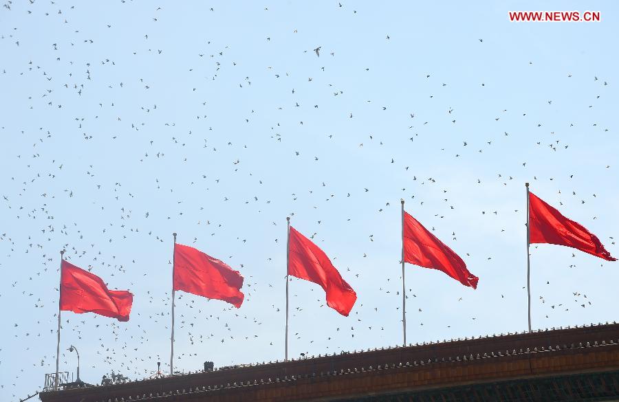Pigeons are released at the end of the commemoration activities marking the 70th anniversary of the victory of the Chinese People&apos;s War of Resistance Against Japanese Aggression and the World Anti-Fascist War, in Beijing, capital of China, Sept. 3, 2015. [Photo/Xinhu]