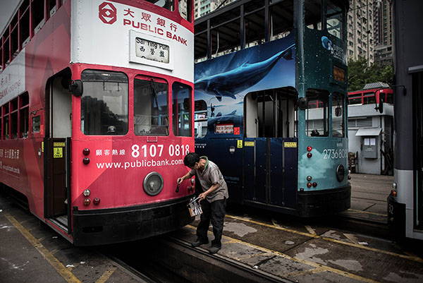 Hongkongers fight to save beloved trams