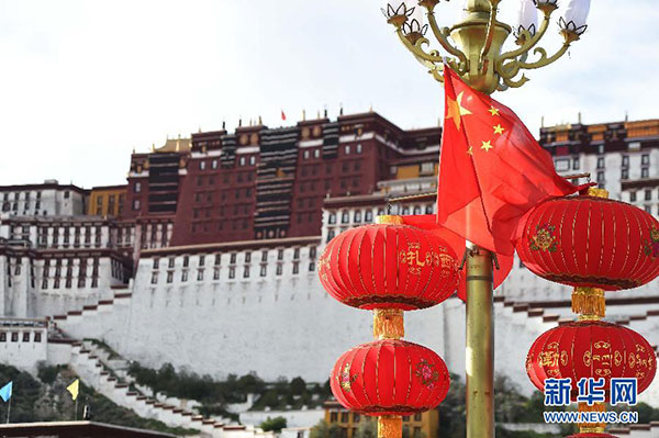 National flags and lanterns are seen on the Potala Palace Square in Lhasa, capital of Southwest China's Tibet autonomous region, Sept 5, 2015. China will hold celebrations for the 50th anniversary of the founding of Tibet Autonomous Region. [Photo/Xinhua]