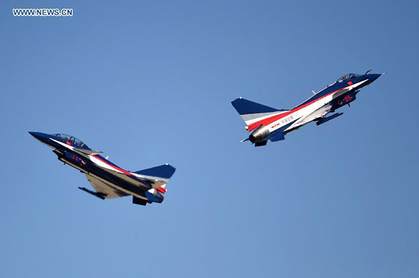 J-10 fighters from the Air Force of the CPLA perform at the Dafangshen Airport in Changchun, capital of Northeast China's Jilin province, Sept 10, 2015.[Photo/Xinhua] 