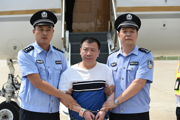 A Chinese corruption suspect at large for 14 years has been repatriated from the United States to China. 