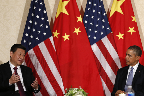 President Xi Jinping meets with his US counterpart Barack Obama on the sidelines of the Nuclear Security Summit in The Hague on March 24, 2014. [Photo/Xinhua]