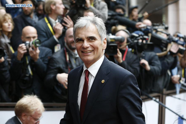 Austria's Chancellor Werner Faymann arrives to attend an European Union (EU) emergency summit on the migration crisis at EU Headquarters in Brussels, Belgium, Sept. 23, 2015. (Xinhua/Ye Pingfan)