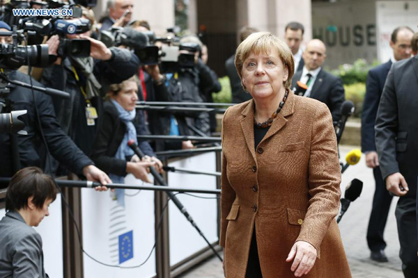 German federal chancellor Angela Merkel arrives to attend an European Union (EU) emergency summit on the migration crisis at EU Headquarters in Brussels, Belgium, Sept. 23, 2015. (Xinhua/Ye Pingfan)