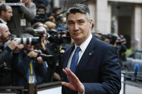 Croatia's Prime minister Zoran Milanovic arrives to attend an European Union (EU) emergency summit on the migration crisis at EU Headquarters in Brussels, Belgium, Sept. 23, 2015. (Xinhua/Ye Pingfan)