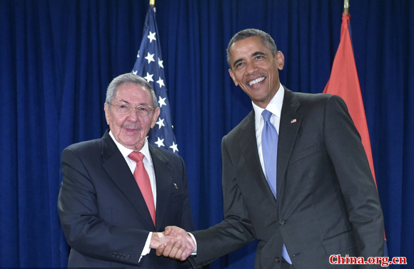 US President Barack Obama shakes hands with Cuba's President Raul Castro during a bilateral meeting on the sidelines of the United Nations General Assembly at UN headquarters in New York on September 29, 2015. [Photo/China.org.cn]