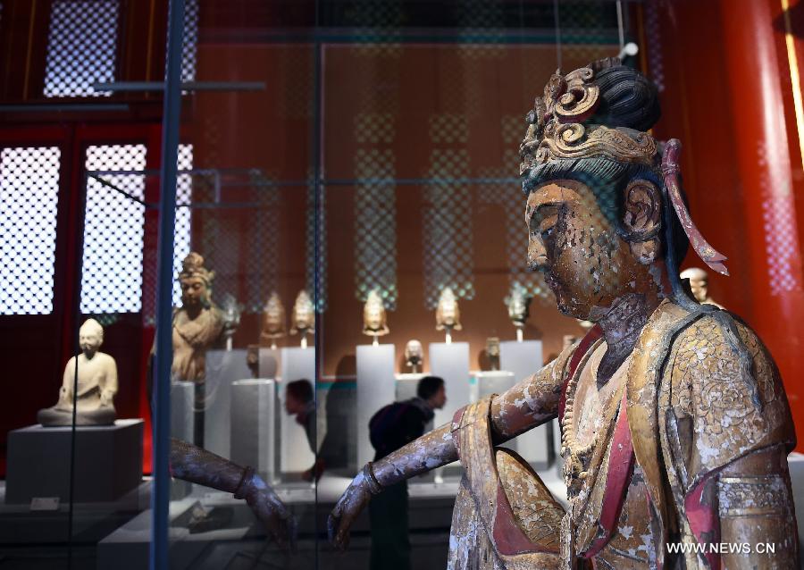 Photo taken on Oct. 8, 2015 shows a Buddha statue at the new exhibition area which is about to open to the public at the Palace Museum in Beijing, captial of China. 