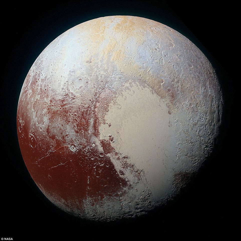 NASA releases Pluto's blue skies and red water ice in new photos, Oct. 8, 2015. [NASA/CRI online]