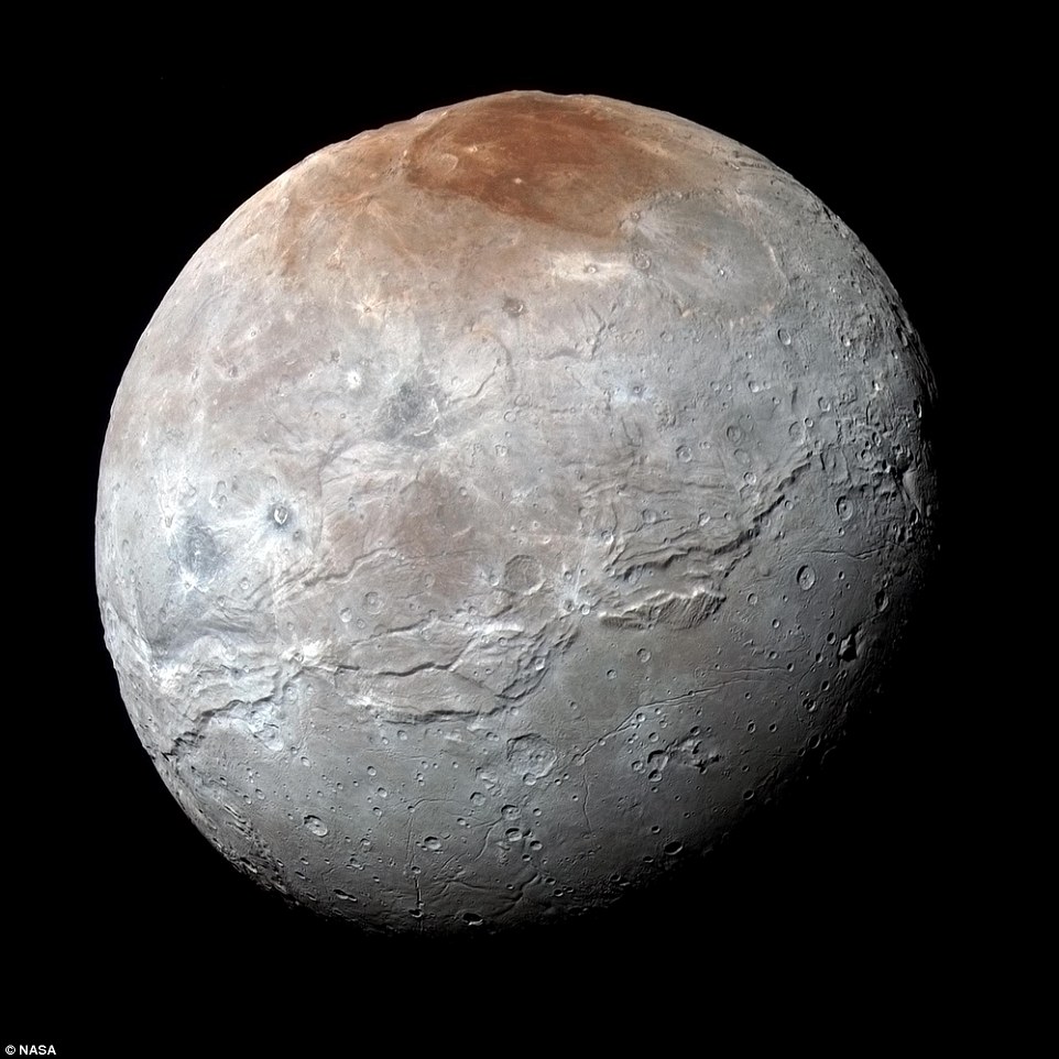 NASA releases Pluto's blue skies and red water ice in new photos, Oct. 8, 2015. [NASA/CRI online]
