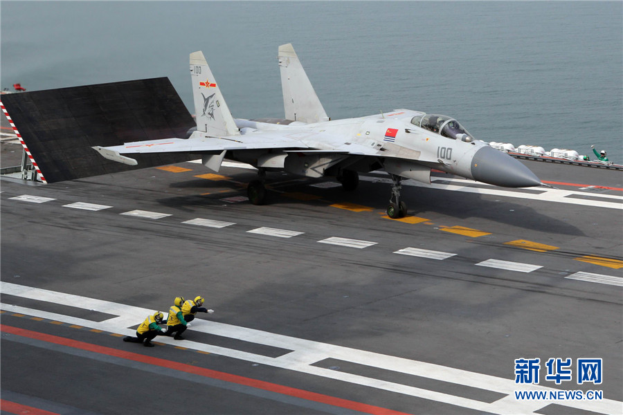 China's carrier fighter J-15, nicknamed 'Flying Shark,' is China's first generation multi-purpose carrier-borne fighter jet, with the capability to carry out various tasks. The rarely released photos show that 'Liaoning' aircraft carrier conducts successful take-off and landing tests of its carrier-borne J-15 fighters. [Xinhua]