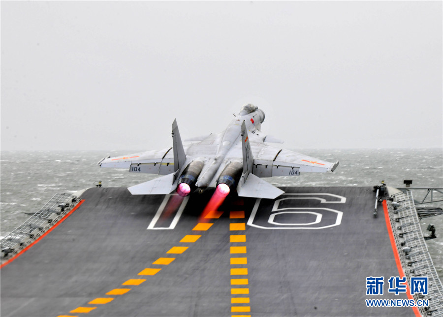 China's carrier fighter J-15, nicknamed 'Flying Shark,' is China's first generation multi-purpose carrier-borne fighter jet, with the capability to carry out various tasks. The rarely released photos show that 'Liaoning' aircraft carrier conducts successful take-off and landing tests of its carrier-borne J-15 fighters. [Xinhua]
