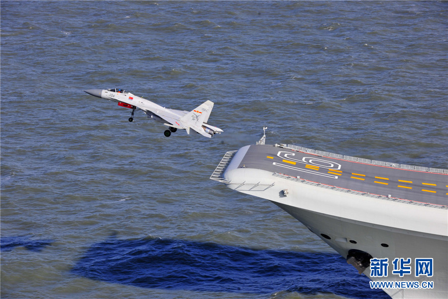 China's carrier fighter J-15, nicknamed 'Flying Shark,' is China's first generation multi-purpose carrier-borne fighter jet, with the capability to carry out various tasks. The rarely released photos show that 'Liaoning' aircraft carrier conducts successful take-off and landing tests of its carrier-borne J-15 fighters. [Xinhua]