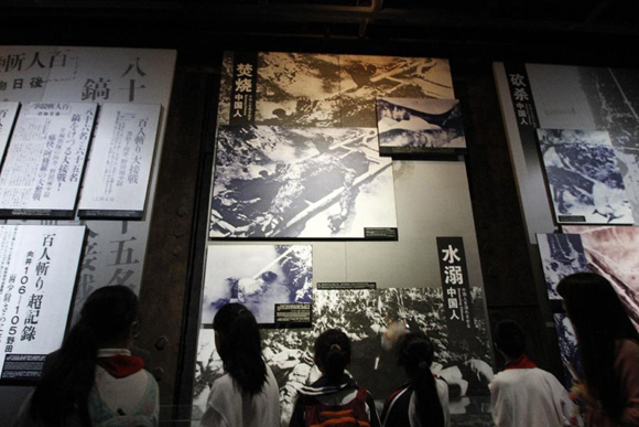 People visit the Memorial Hall of the Victims in Nanjing Massacre by Japanese Invaders in Nanjing, capital of east China's Jiangsu Province, Oct. 10, 2015. Documents of the Nanjing Massacre from China were inscribed on the Memory of the World Register by the International Advisory Committee of UNESCO's Memory of the World Programme, UNESCO announced on Oct. 9 in a press release. 