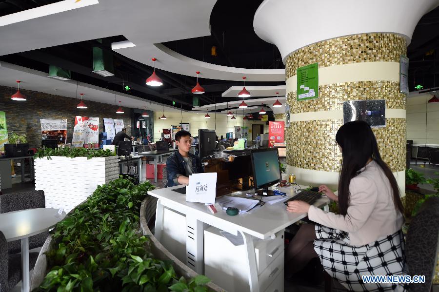 Employees of start-ups work at an incubator center in Lanzhou city, capital of northwest China&apos;s Gansu Province. Oct. 10, 2015. 