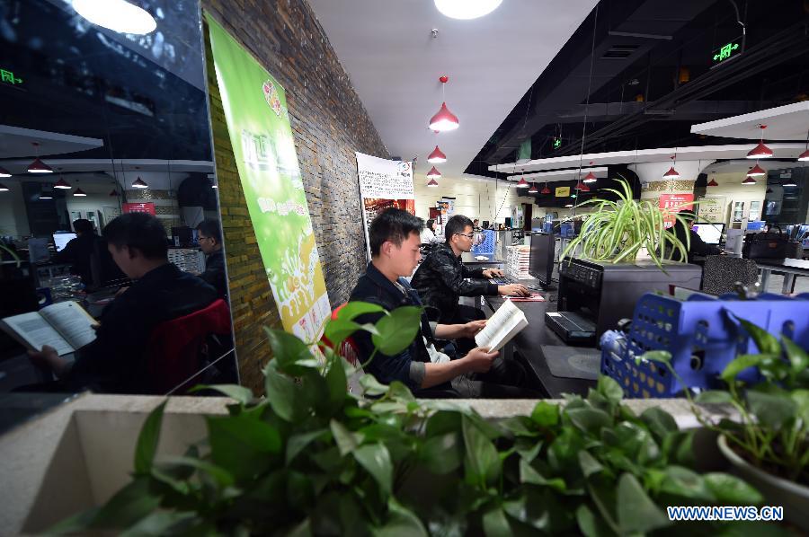 Employees of start-ups work at an incubator center in Lanzhou city, capital of northwest China&apos;s Gansu Province. Oct. 10, 2015. 