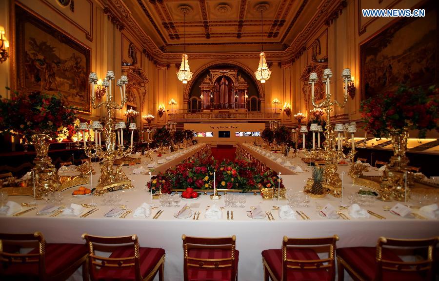 Photo taken on Sept. 7, 2015 shows the ballroom set for a state banquet at the Buckingham Palace in London, capital of Britain. The Buckingham Palace has served as the official London residence of Britain's sovereigns since 1837 and today is the administrative headquarters of the Monarch. [Xinhua]