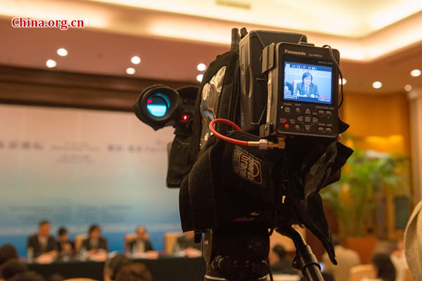 Yasushi Kudo, president of the Genron NPO (R3) speaks at the press conference on the 11th Beijing-Tokyo Forum in Beijing on Oct. 22, 2015. [Photo by Chen Boyuan / China.org.cn]