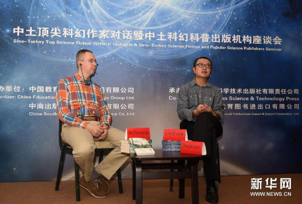 Liu Cixin (R), author of Chinese sci-fi bestseller 'The Three-Body Problem,' and Baris Mustecaplioglu, known for his 'Perg Efsaneleri: Korkak ve Canavar.' [Xinhua]