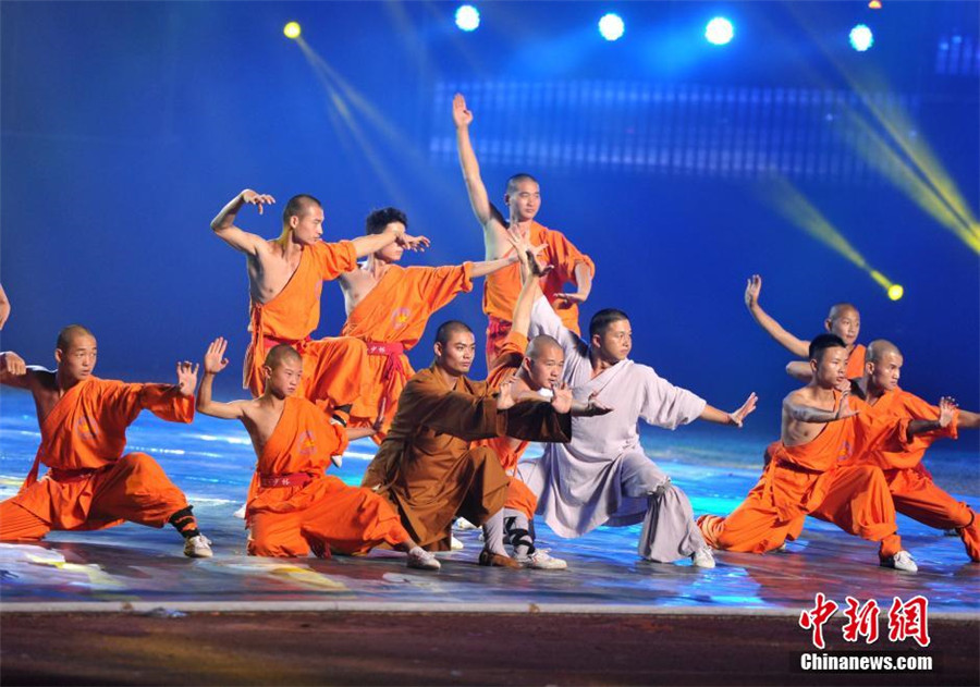 Monks perform at the fifth China South Shaolin martial arts and culture festival held in Putian City, Fujian Province on Nov 8, 2015. The festival has brought together various schools and aims to promote Chinese Buddhist culture. 