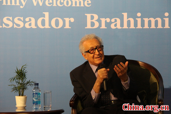 Lakhdar Brahimi gives a presentation on the Syrian issue during his visit to CIPG. [Photo by Wang Nan/China.org.cn]