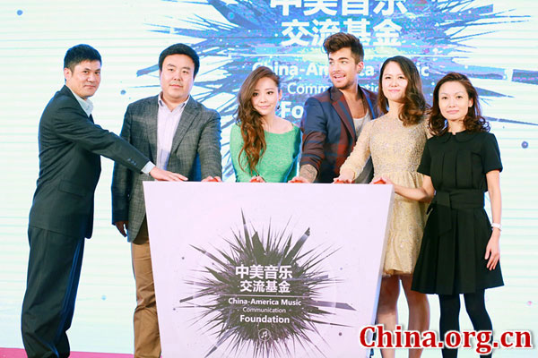 Chinese singer Jane Zhang, American singer Adam Lambert and other music executives launch the China-America Music Communication Foundation in Beijing, on Nov. 9, 2015. [Photo/China.org.cn]