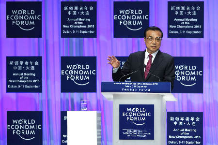 Chinese Premier Li Keqiang delivers a speech at the opening ceremony of the Ninth Summer Davos Forum in Dalian on September 10, 2015.