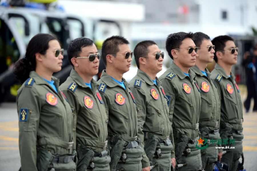 Photos provided by 81.cn show that performers of Bayi Aerobatics Team pose for 66th anniversary of China's PLA air force's founding, which falls on Nov. 11, 1949. [Photo/81.cn]