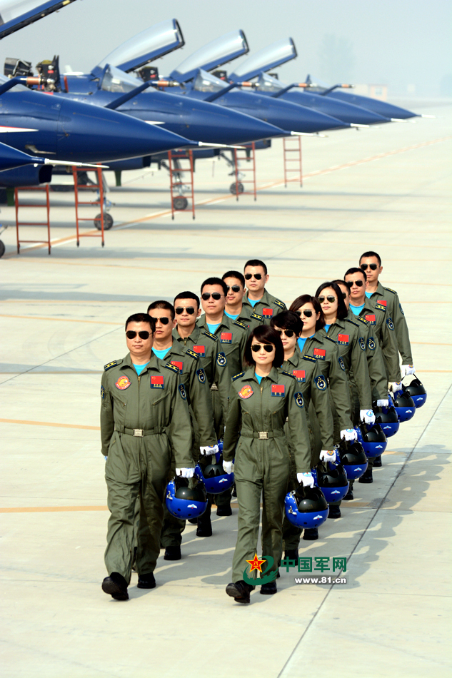 Photos provided by 81.cn show that performers of Bayi Aerobatics Team pose for 66th anniversary of China's PLA air force's founding, which falls on Nov. 11, 1949. [Photo/81.cn]